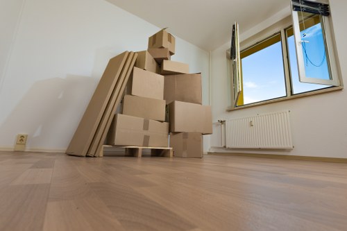 Professional movers handling furniture during a Catford house relocation