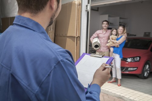 Household items being loaded into a moving van