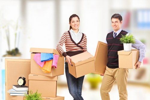 Local office moving service preparing equipment and packing for a workplace move