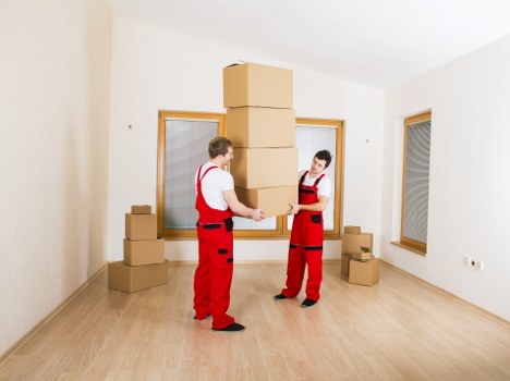 Professional team collecting office furniture in Catford